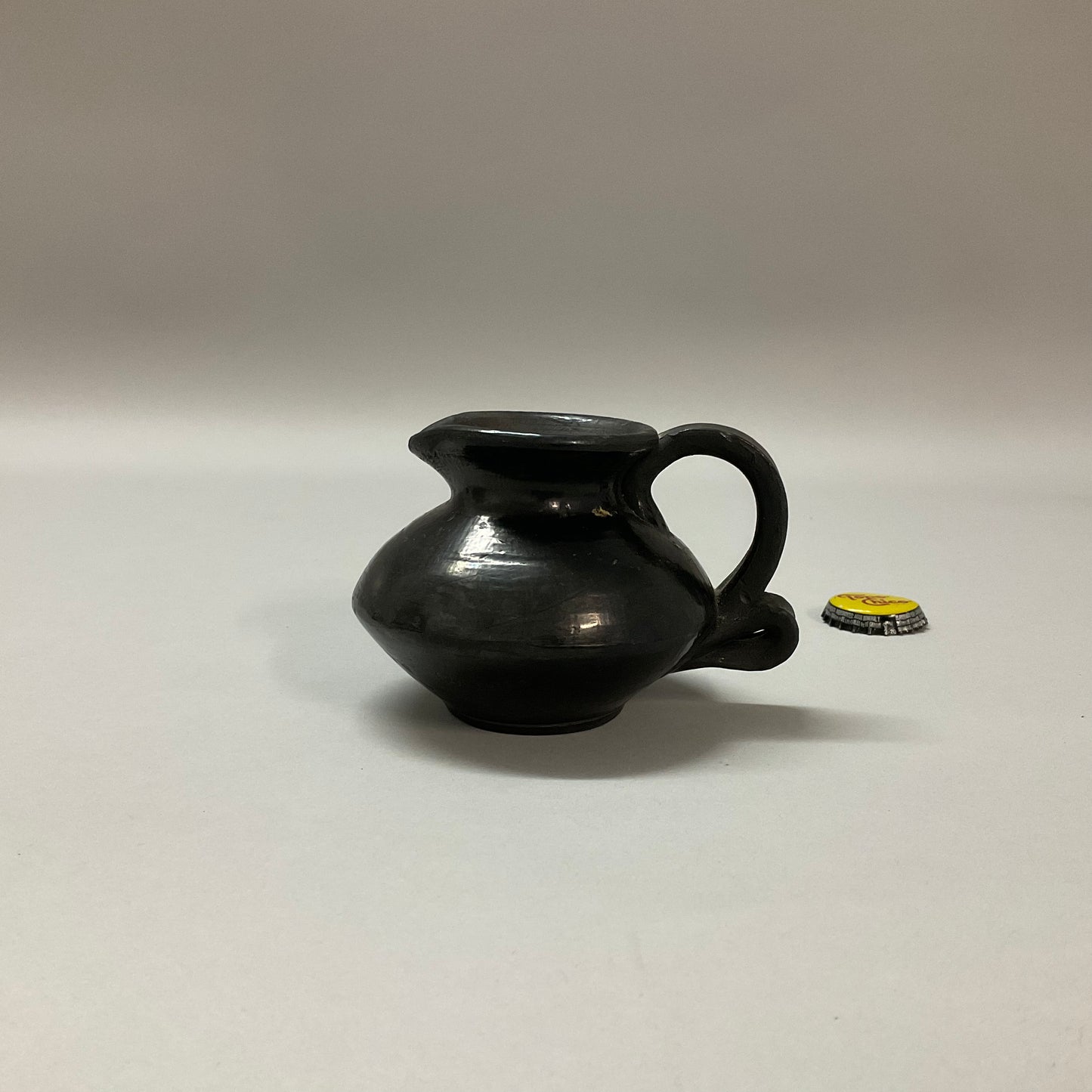 Small Black Pitchers