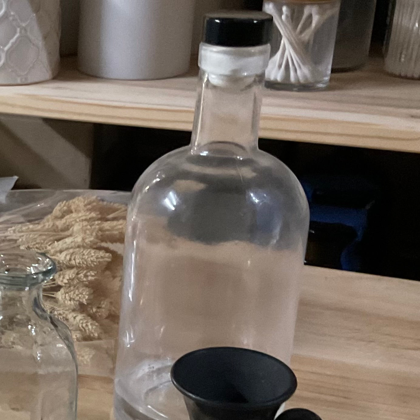 Glass Bottle with Black Lid