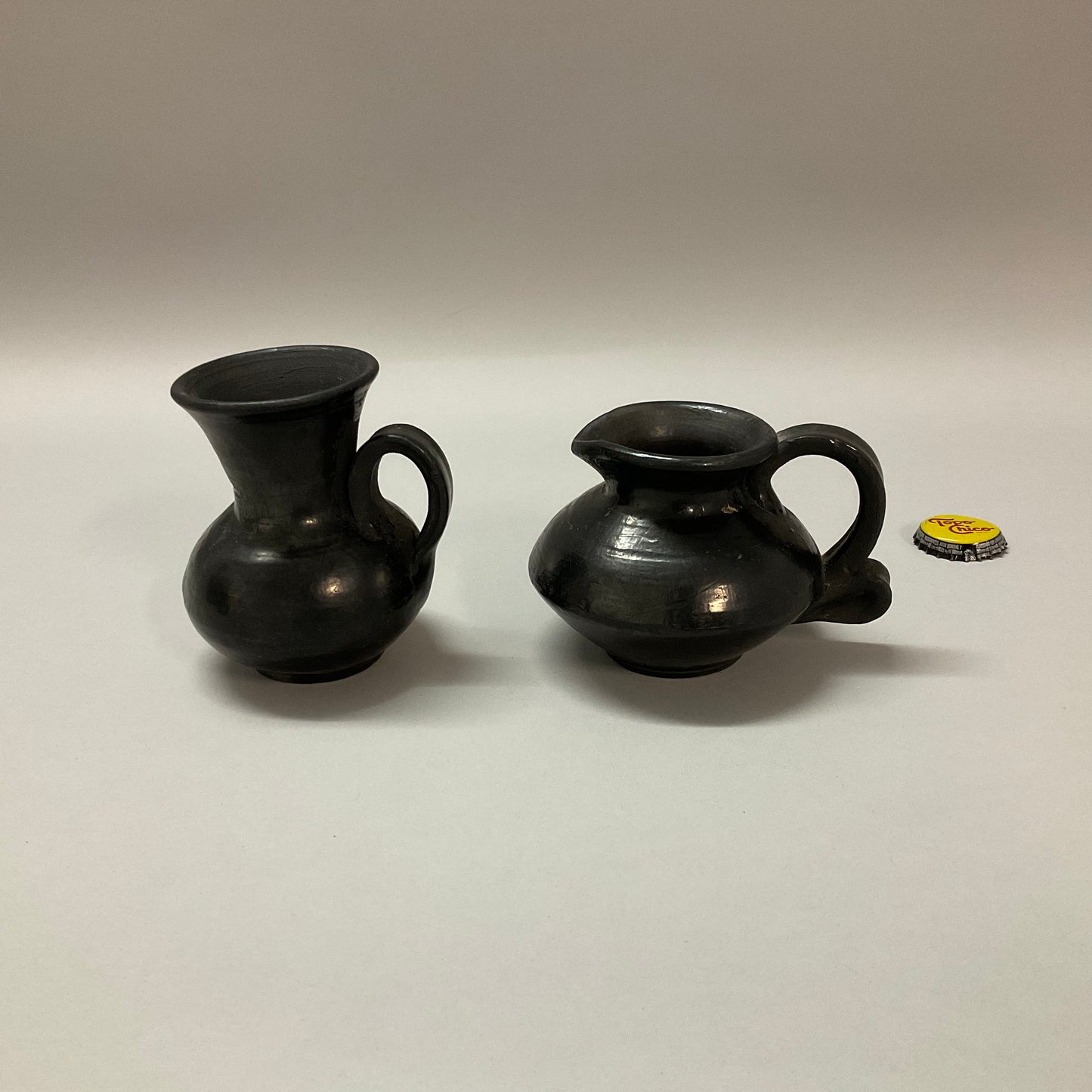 Small Black Pitchers
