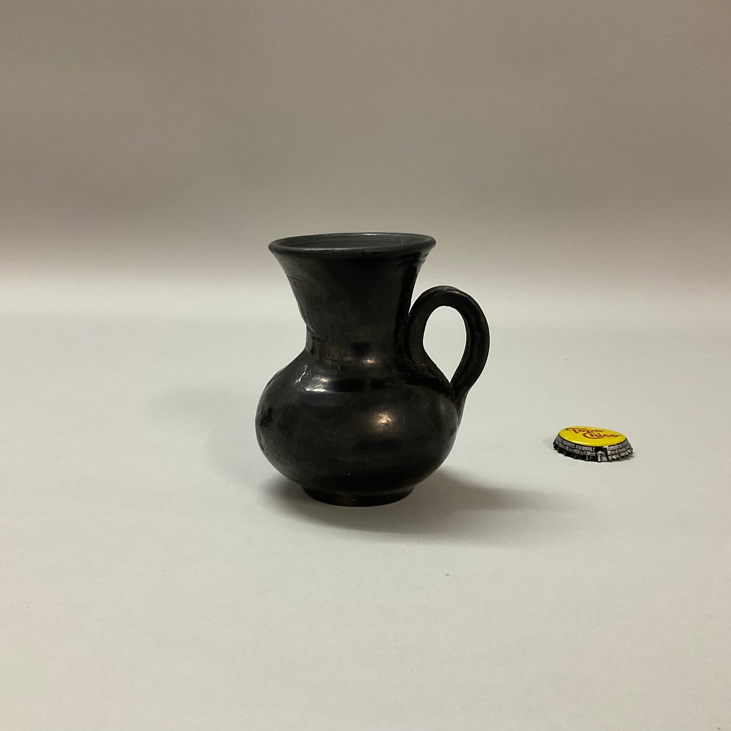 Small Black Pitchers