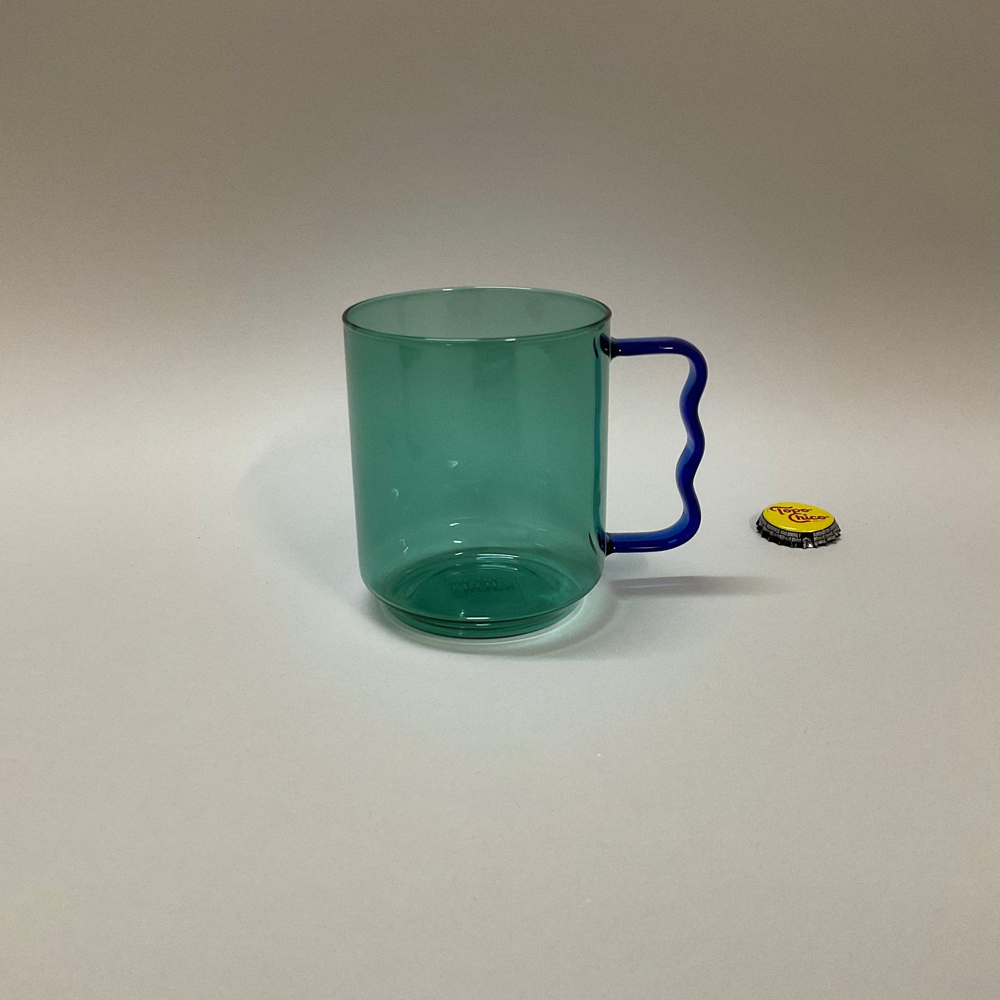 Green Glass Mug with Blue Handle