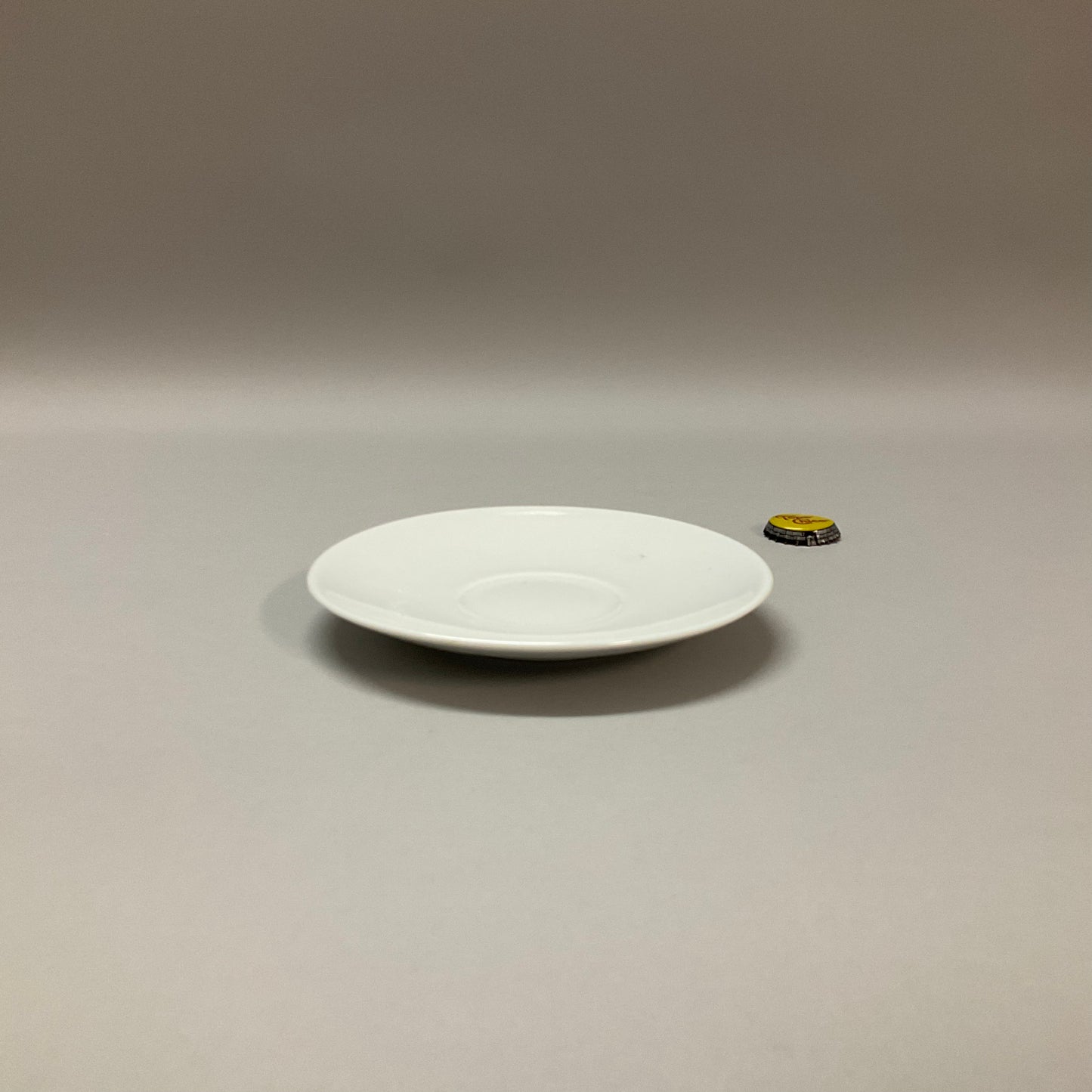 White Ceramic Tapered Cup and Saucer
