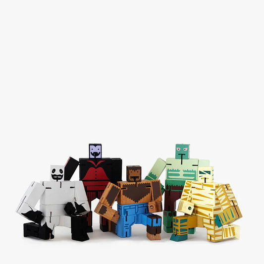 Set of colorful toy figures on a white background