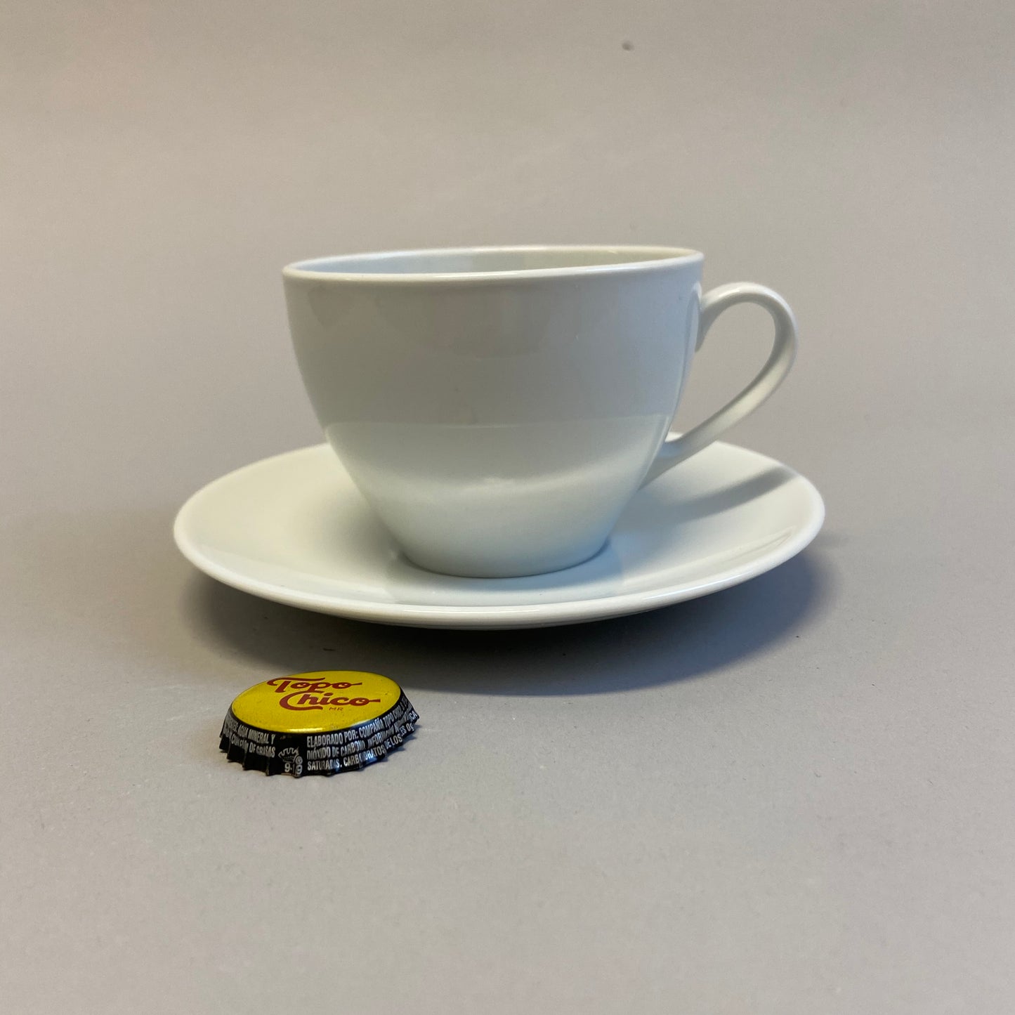 White Ceramic Tapered Cup and Saucer